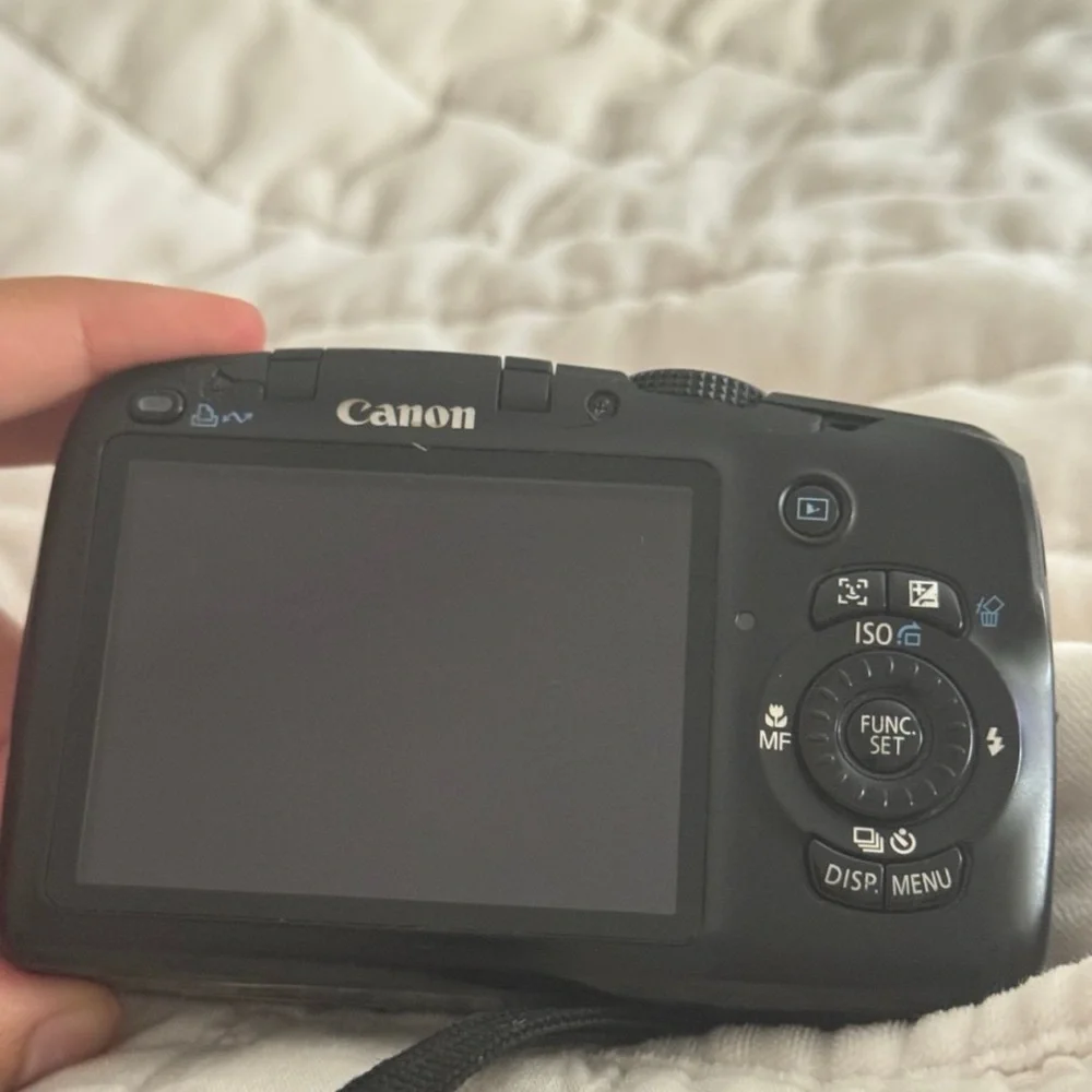 Canon Black Digital Camera with Blue Display